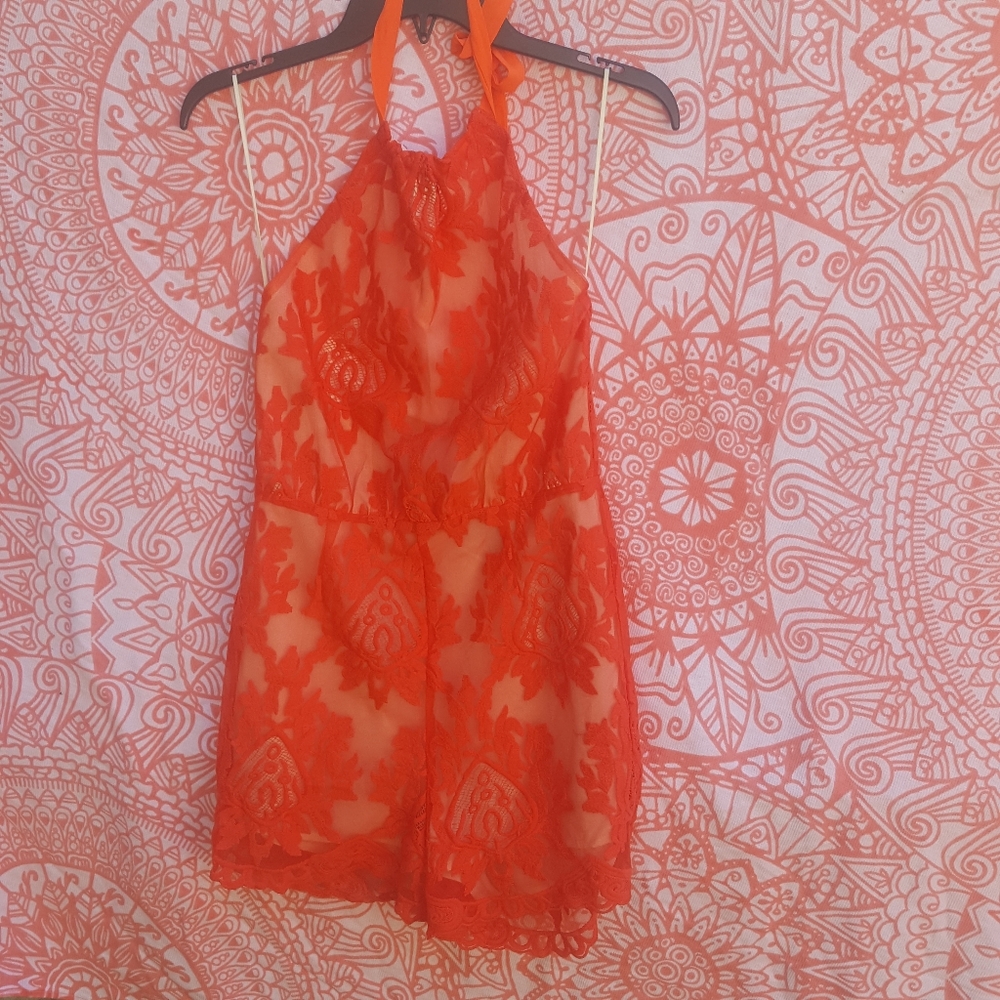 Orange foral romper by aqua
